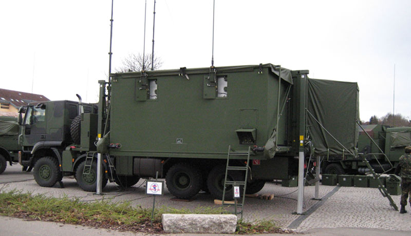 Deployable container operated on a truck
