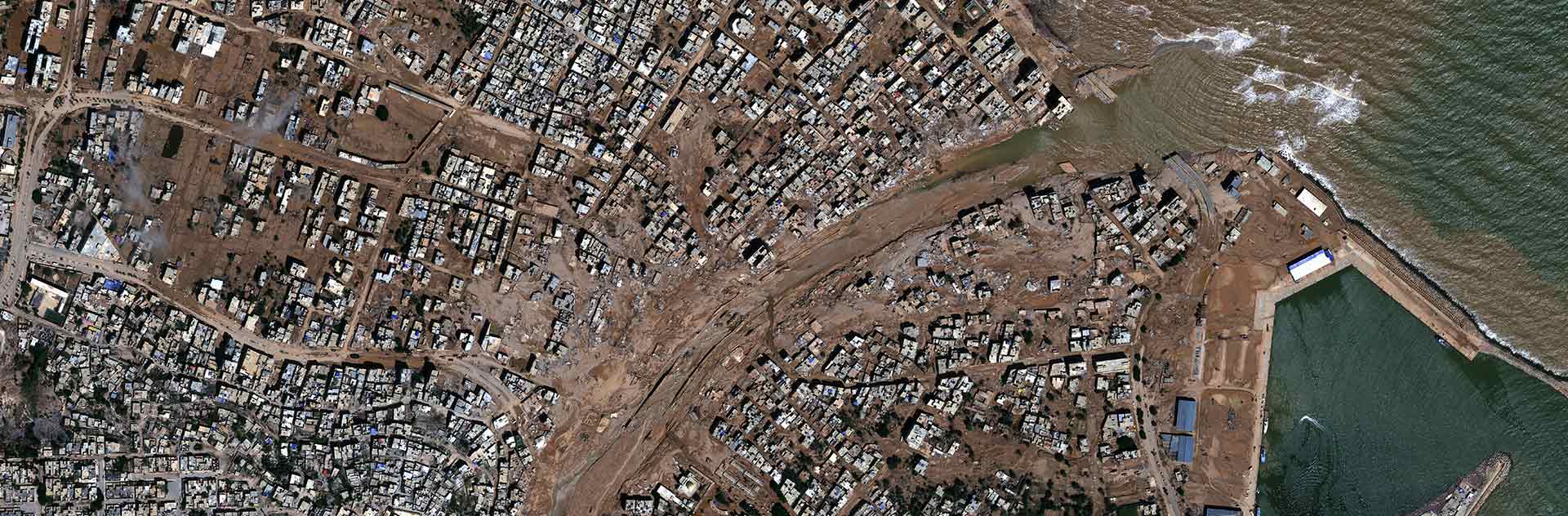 Pléiades Neo satellite imagery shows the scale of damage to city after floodwaters swept away bridges, streets and communities